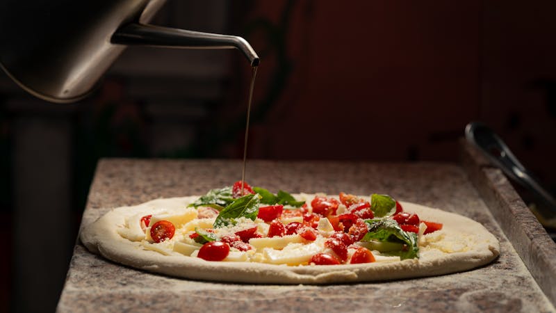 Pizza luce team working together in the kitchen