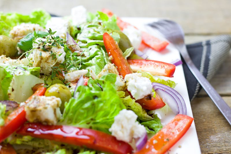 Greek Salad — cucumbers, tomatoes, feta, olives, red onion